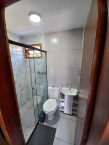 Koupelna v ubytování Arandu Chalés