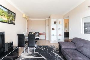 Posezení v ubytování Vue mer Plage Catalans Vieux Port Clim - 2 chambres