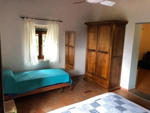 A bed or beds in a room at Poggio Savelli