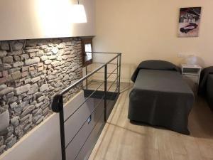 A bed or beds in a room at Poggio Savelli