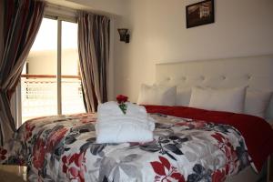 Postel nebo postele na pokoji v ubytování Hotel La Place