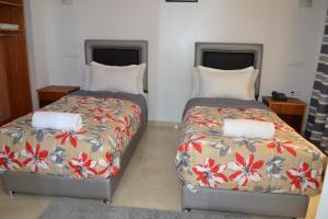 Postel nebo postele na pokoji v ubytování Hotel La Place