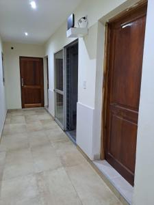 a hallway of a house with a door at ALOJAMIENTO NORTE SGO in Santiago del Estero