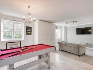 a room with a pool table and a couch at 4 bed property in Richmond 77835 in Richmond