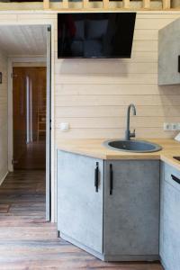 Kuchyň nebo kuchyňský kout v ubytování Tiny House Flexhome + 6 fotografií