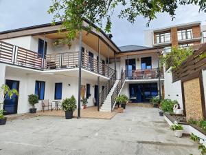 an exterior view of a house with a courtyard at GTL Apartment in Tbilisi City