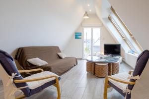 TV a/nebo společenská místnost v ubytování Appartement 100m2 Vilvic vue mer