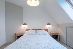 Postel nebo postele na pokoji v ubytování Appartement 100m2 Vilvic vue mer