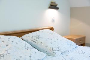 Postel nebo postele na pokoji v ubytování Appartement 100m2 Vilvic vue mer