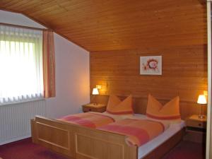 Ένα ή περισσότερα κρεβάτια σε δωμάτιο στο Haus Marita