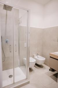 Ванна кімната в Suite Maxxi Roma