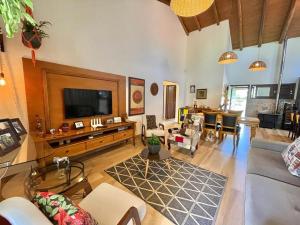 TV a/nebo společenská místnost v ubytování Laguna Farol sta Marta