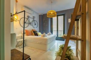 Posteľ alebo postele v izbe v ubytovaní Dos de Mayo Loft by Valcambre