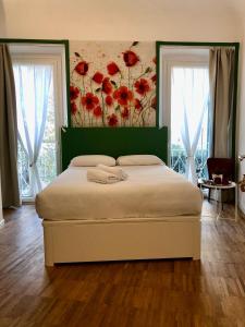 Postel nebo postele na pokoji v ubytování DIMOR'A' ROOMS