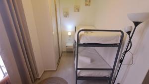 Postel nebo postele na pokoji v ubytování Nest Style Granada