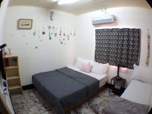 Letto o letti in una camera di Gods Home