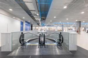 a baggage carousel in a shopping mall at NFS - Národný futbalový štadión - Apartman in Bratislava