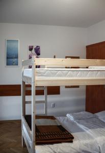 Postel nebo postele na pokoji v ubytování Hostel Wielka Krokiew