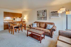 a living room with a couch and a table at Lewiston Vacation Rental with Nearby River Access! in Lewiston