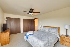 a bedroom with a bed and a ceiling fan at Lewiston Vacation Rental with Nearby River Access! in Lewiston