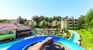 an aerial view of a resort with a water park at Melas Holiday Village in Side