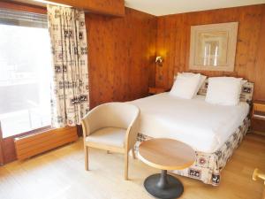 Voodi või voodid majutusasutuse Between Boutique Hotel toas