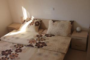 Postel nebo postele na pokoji v ubytování Apartments Miletic J-I