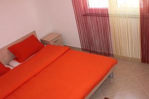 Postel nebo postele na pokoji v ubytování Apartments Miletic J-I