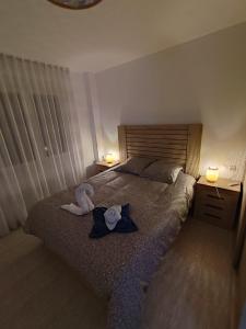 Postel nebo postele na pokoji v ubytování Résidence Maëlla
