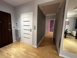 Posteľ alebo postele v izbe v ubytovaní Apartament Włodarzewska