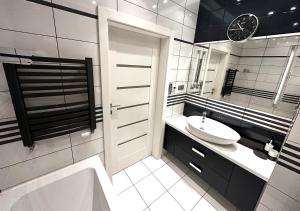 Kúpeľňa v ubytovaní Apartament Włodarzewska