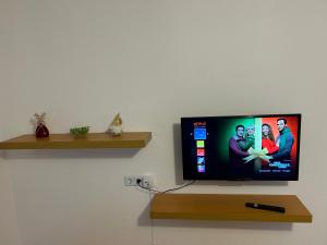 a flat screen tv sitting on a wall at Wohnung VS 3 in Villingen-Schwenningen