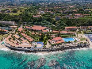 an aerial view of the resort and the ocean at Villaggio Torre Ruffa in Capo Vaticano
