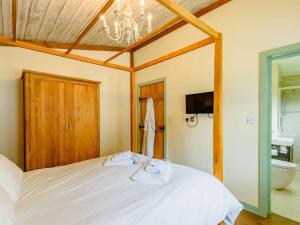 En eller flere senge i et værelse på 2 bed in Sherwood Forest 88427