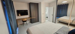 Posteľ alebo postele v izbe v ubytovaní Apartments Lisinski - Private parking