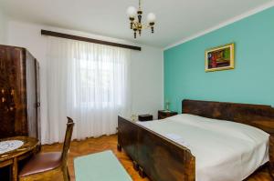 Postel nebo postele na pokoji v ubytování Apartment Pavo