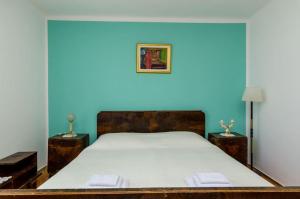 Postel nebo postele na pokoji v ubytování Apartment Pavo