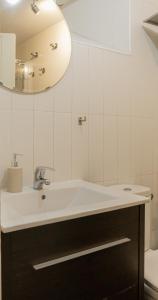 a bathroom with a sink and a mirror at Luna in Hervás