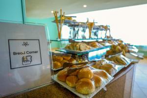 a bakery with a bunch of loaves of bread at Blend Club Aqua Resort in Hurghada