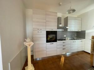 Kuchyň nebo kuchyňský kout v ubytování Casa Renalda