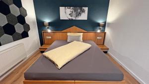 Postel nebo postele na pokoji v ubytování HIL - Hotel im Lus Schopfheim