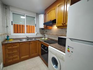 Kuchyň nebo kuchyňský kout v ubytování ACV - Bahia Park-1ª linea planta 2 frontal