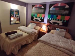A bed or beds in a room at Casa Terzia a 10 min de Logroño