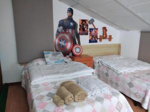 A bed or beds in a room at Casa Terzia a 10 min de Logroño