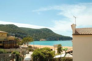 a view of a beach and the ocean from a building at Maria Vittoria in Campese