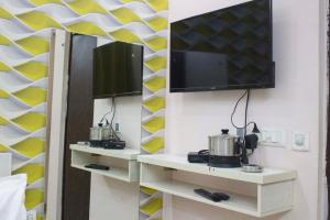 TV a/nebo společenská místnost v ubytování JSB HOTEL