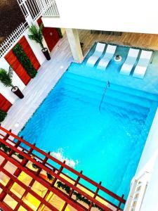 Bazén v ubytování Nautilus by La Jamaca Hotels-Downtown La Parguera nebo v jeho okolí