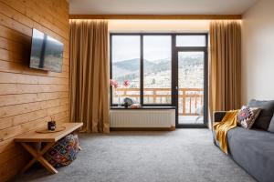 TV a/nebo společenská místnost v ubytování Yo Hotel