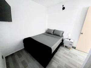 Llit o llits en una habitació de El refugio paisa