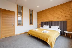 Postel nebo postele na pokoji v ubytování Yo Hotel